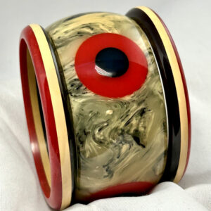 AB1 Brandon red/black bullseye on marbled black/pale yellow bakelite bangle